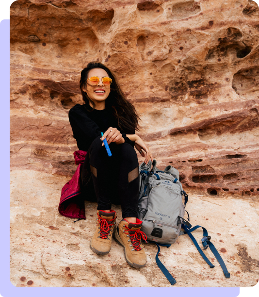 Women Hiking on Rocks with Airo Sport Vape Battery